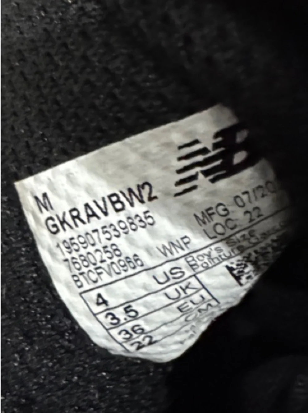 New Balance Black and White Unisex Sneakers